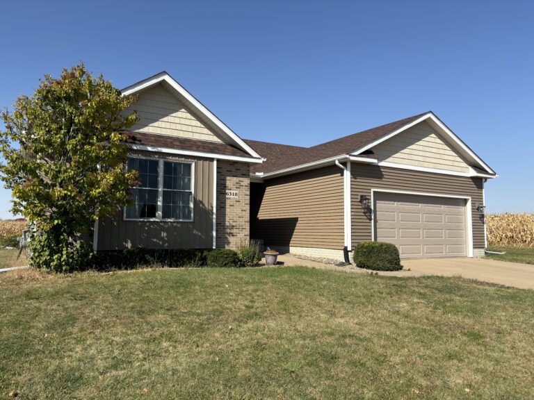 Professional siding installation on a residential home by a Silvis siding contractor