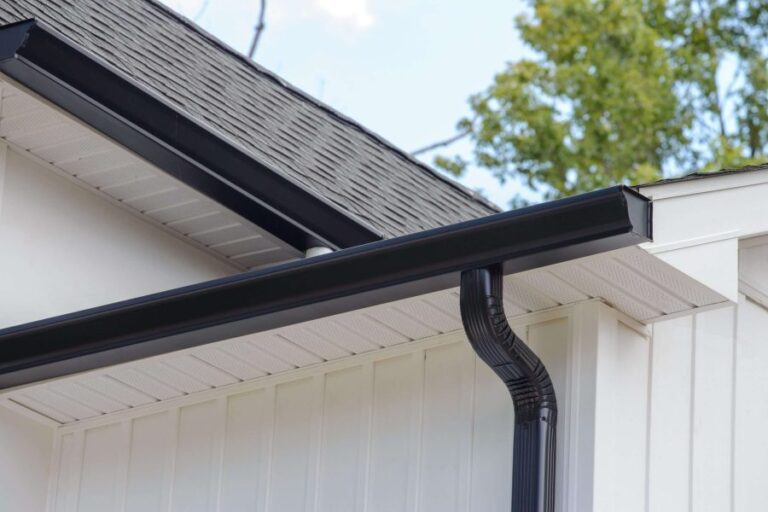 Expertly installed seamless gutters on a Le Claire home, professionally built to ensure proper drainage and long-term protection against water damage.