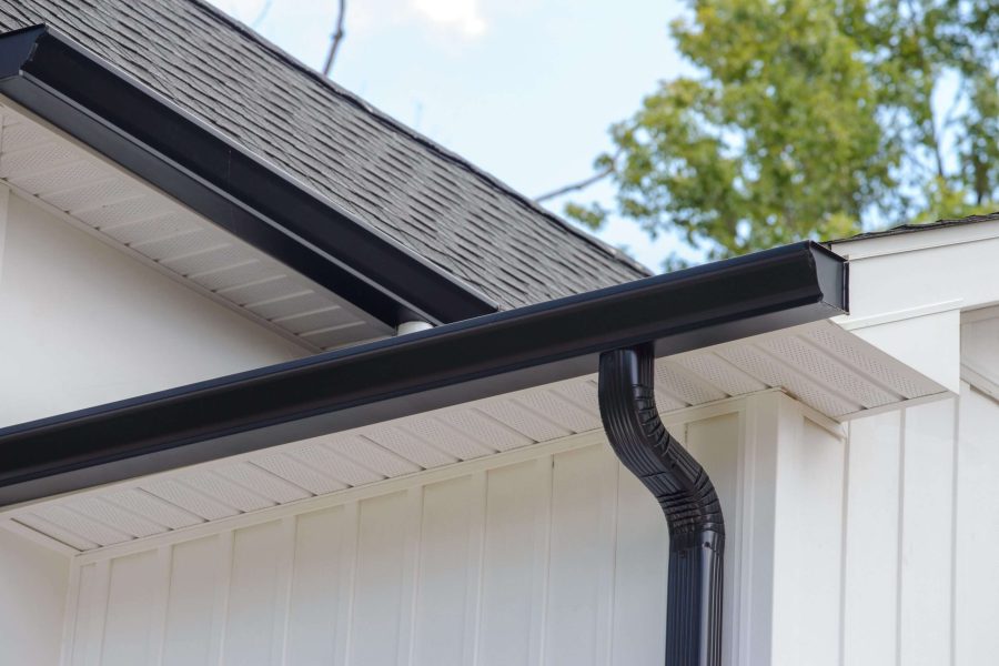 Expertly installed seamless gutters on a Le Claire home, professionally built to ensure proper drainage and long-term protection against water damage.